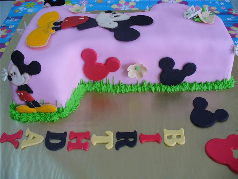 Side view of Hayly's mickey mouse cake After Hayly's father arrived home